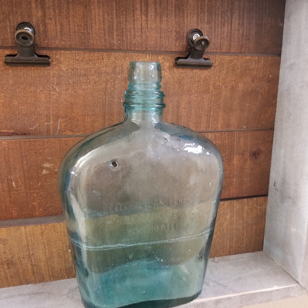 Antique aqua blue bottle